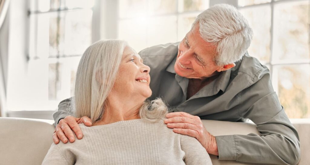 Gardens at Shadow Hills | Seniors smiling on the couch