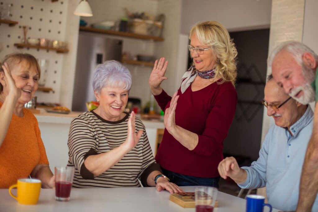 Gardens at Shadow Hills | Seniors Playing a game and laughing